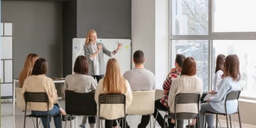 people assisting a training